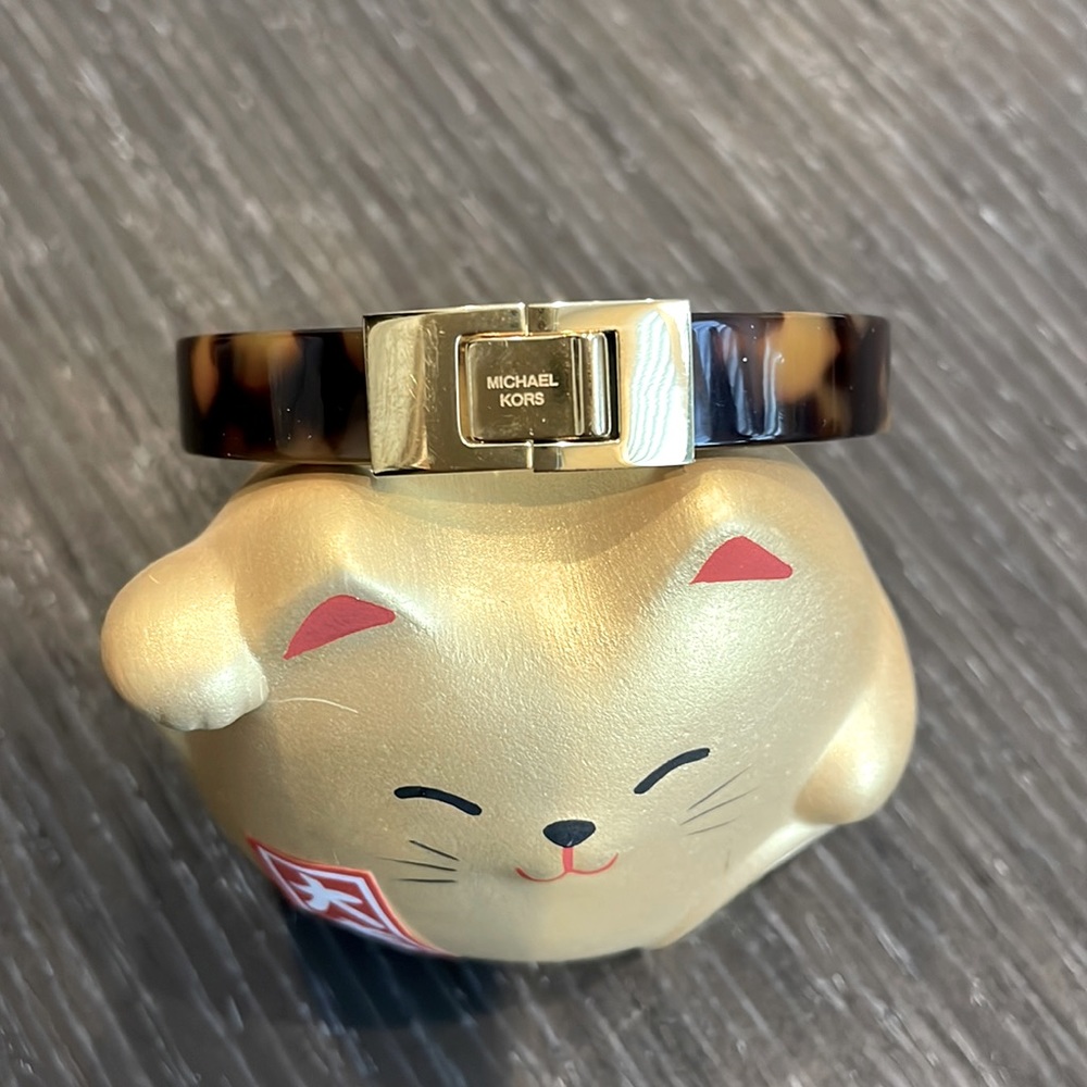 Michael Kors Bracelet . Tortoise shell. Hinged closure